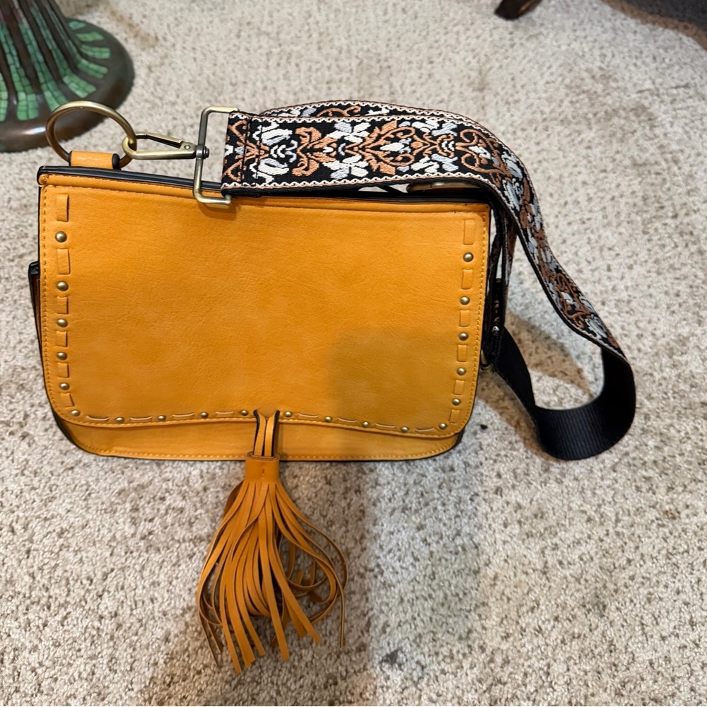 Stylish Yellow Leather Bag with Patterned Strap